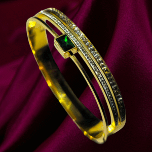 Gold-Plated Bracelet with Green Gemstone and Crystal Detailing