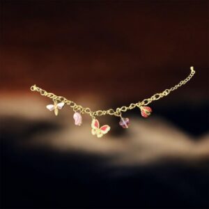 Butterfly & Charm Gold Bracelet